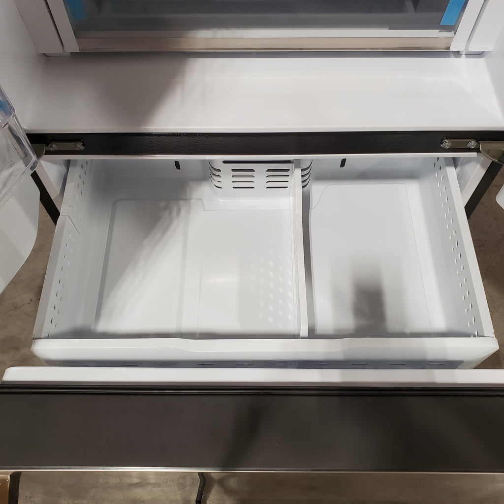 GE Cafe 27.8-cu ft French Door Refrigerator with Ice Maker, Water and Ice Dispenser ENERGY STAR in Stainless Steel 31131SD21 - CFE28TSHSS - Scratch & Dent (Minor)