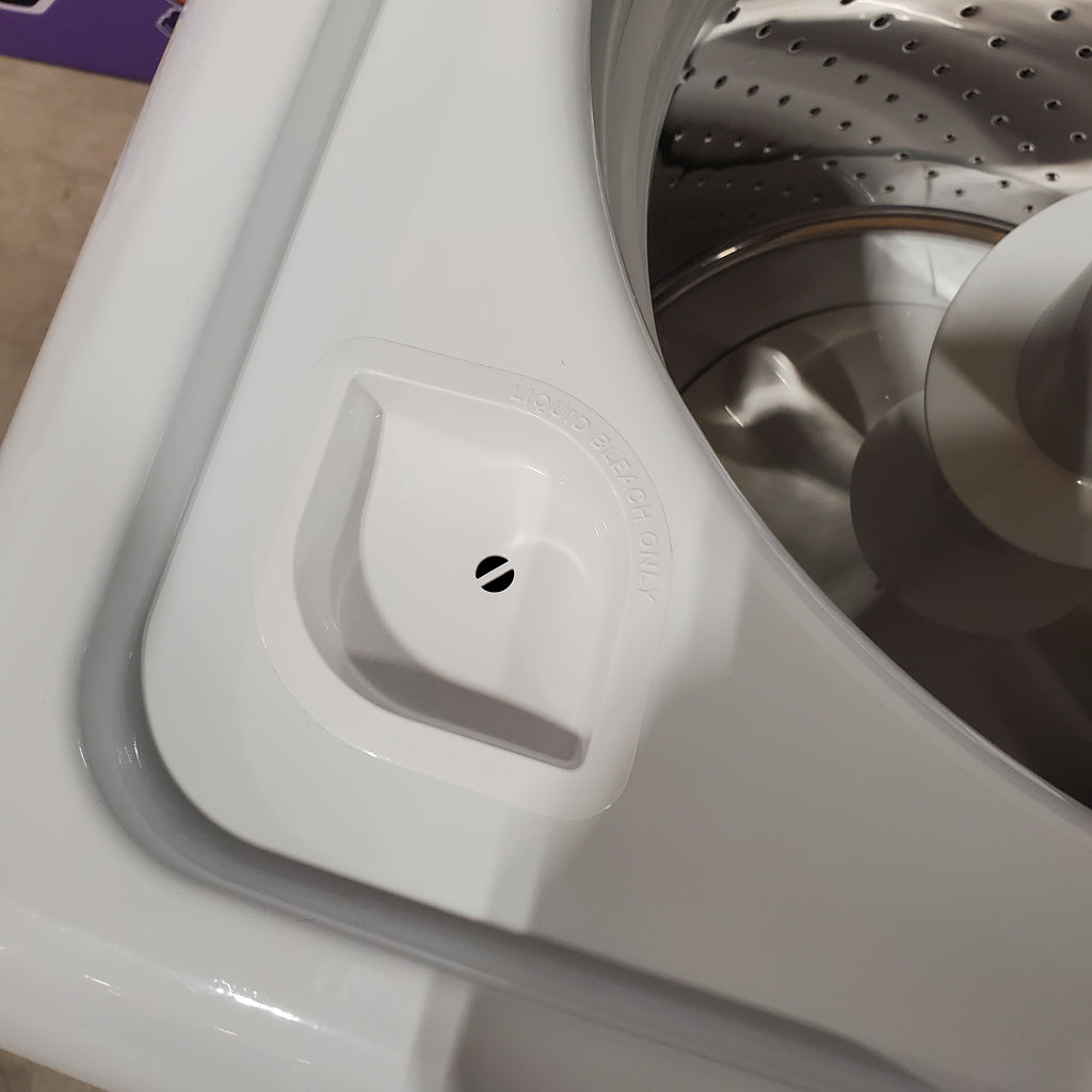 Pictures of GE White Top Load 4.0 Cu. Ft. Capacity Washer with Stainless Steel Wash Basket GTW325ASWWW - New in Box and GE 7.2 cu. ft. Capacity Aluminized Alloy Drum Gas Dryer in White 16208 - GTD42GASJWW - Certified Refurbished - Neu Appliance Outlet - Discount Appliance Outlet in Austin, Tx