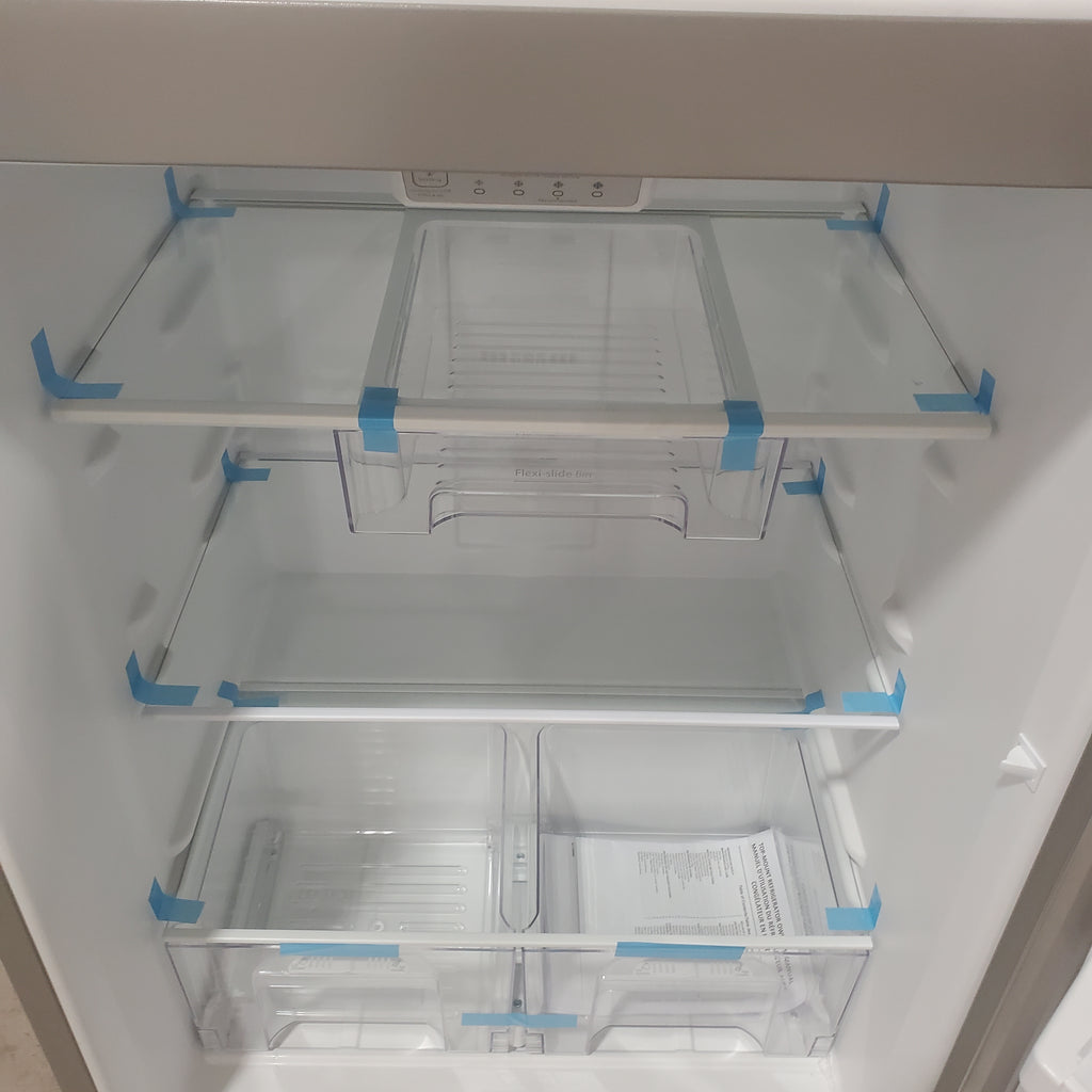 Pictures of Whirlpool Monochromatic Stainless Steel 18 cu ft 30" Wide ENERGY STAR Top-Freezer Refrigerator with Clear, Humidity Controlled Crispers WRT148FZDM - Scratch & Dent - Minor - Neu Appliance Outlet - Discount Appliance Outlet in Austin, Tx