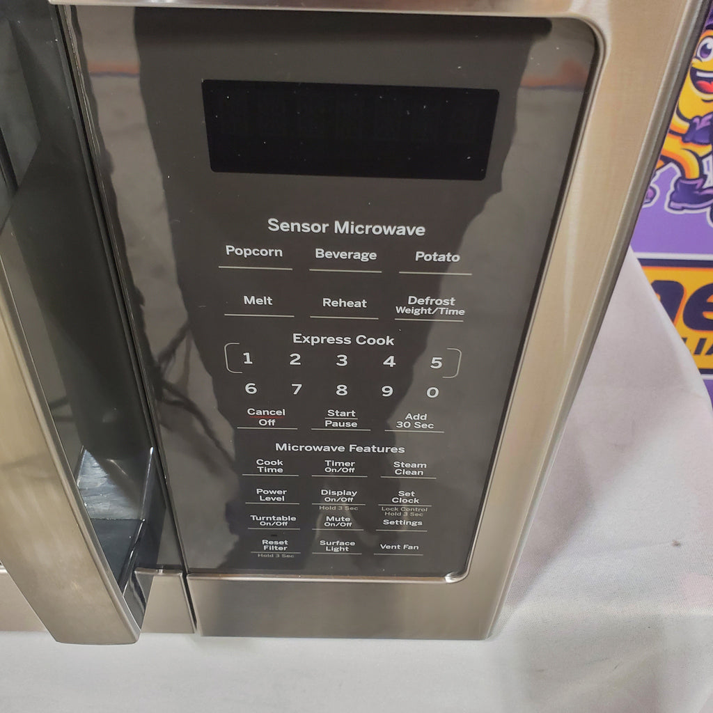 Pictures of GE Over-The-Range Sensor 1.9 Cu. Ft. Microwave Oven with Filter Indication Light and Steam Clean 17SD230 - JVM7195SKSS - Open Box - Neu Appliance Outlet - Discount Appliance Outlet in Austin, Tx