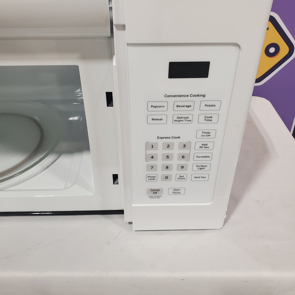 GE 1.6 cu. ft. Over the Range Microwave in White with 13.5 inch Defrost Options 25SA242 - JVM3160DFWW - Open Box