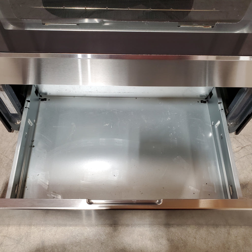 Pictures of Whirlpool 4.8 cu. ft. Capacity Electric Range with 9"/6" Dual Radiant Element 1CR02128 - WFE320M0AS - Certified Refurbished - Neu Appliance Outlet - Discount Appliance Outlet in Austin, Tx