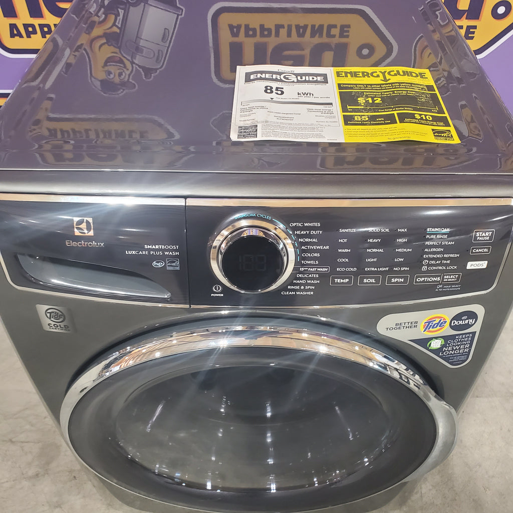 Pictures of Electrolux Titanium Front Load 600 Series 4.5 Cu. Ft. Washer with Smartboost ELFW7637AT - Scratch & Dent (Minor) and Electrolux 8 cu. ft. vented Front Load Stackable 600 Series Electric Dryer in Titanium with LuxCare Dry 16032 - ELFE7637AT - New in Box - Neu Appliance Outlet - Discount Appliance Outlet in Austin, Tx