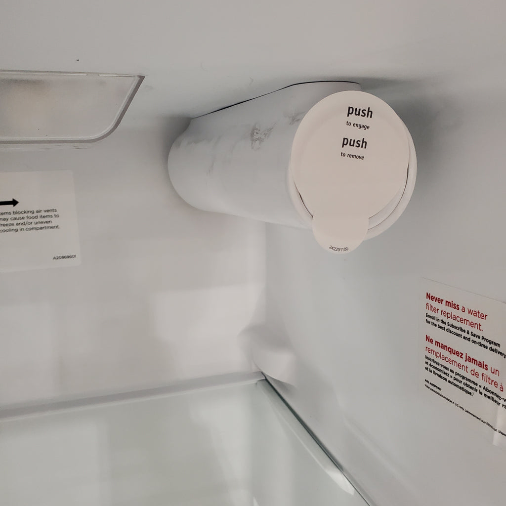 Pictures of Frigidaire 33" Wide 22.3 cu. ft. ENERGY STAR Side by Side Refrigerator Stainless Steel with Exterior Water and Ice Dispenser 20SD105 - FRSS2323AS - Scratch & Dent (Minor) - Neu Appliance Outlet - Discount Appliance Outlet in Austin, Tx