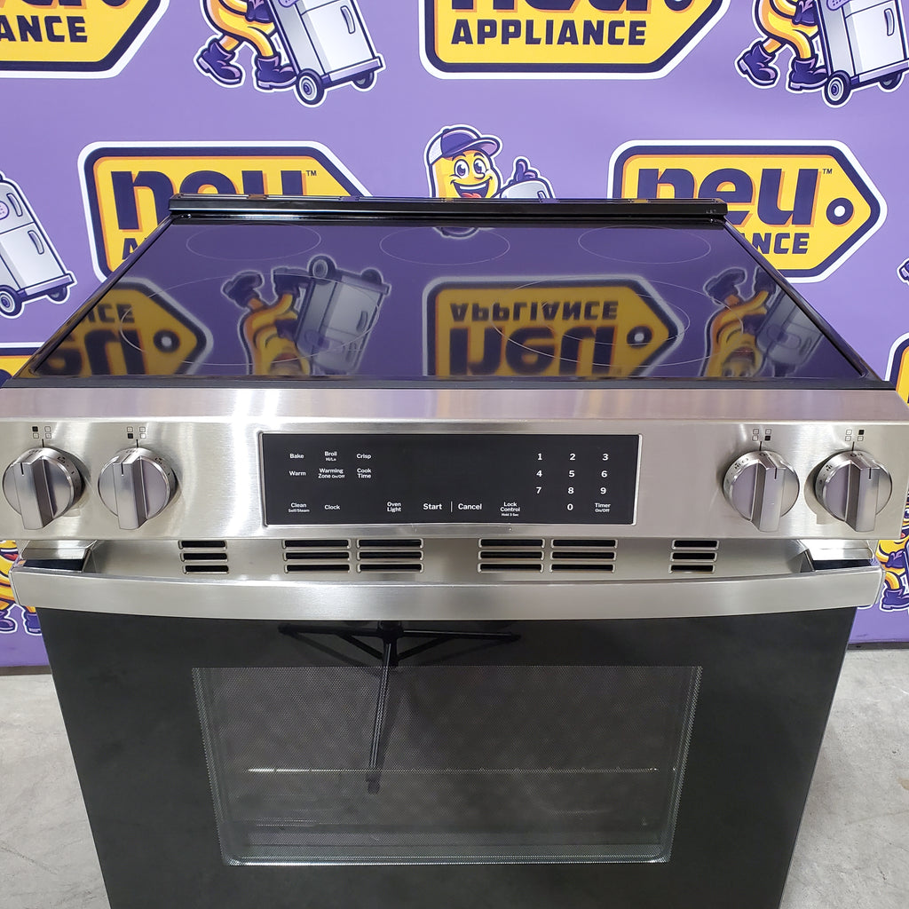 Pictures of GE® Stainless Steel Front Control Slide-In Electric Range with Crisp Mode and 5 Burner Radiant Cooktop 251310SD910 - GRS500PV2SS - Scratch & Dent (Minor) - Neu Appliance Outlet - Discount Appliance Outlet in Austin, Tx
