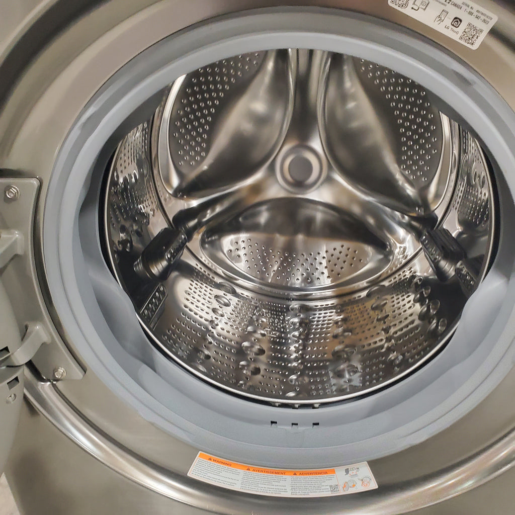 Pictures of LG Graphite Steel Front Load WashTower Single Unit with Center Controls 4.5 Cu. Ft. Washer and 7.4 Cu. Ft. Dryer 3SD886 - WKE100HVA - Open Box - Neu Appliance Outlet - Discount Appliance Outlet in Austin, Tx