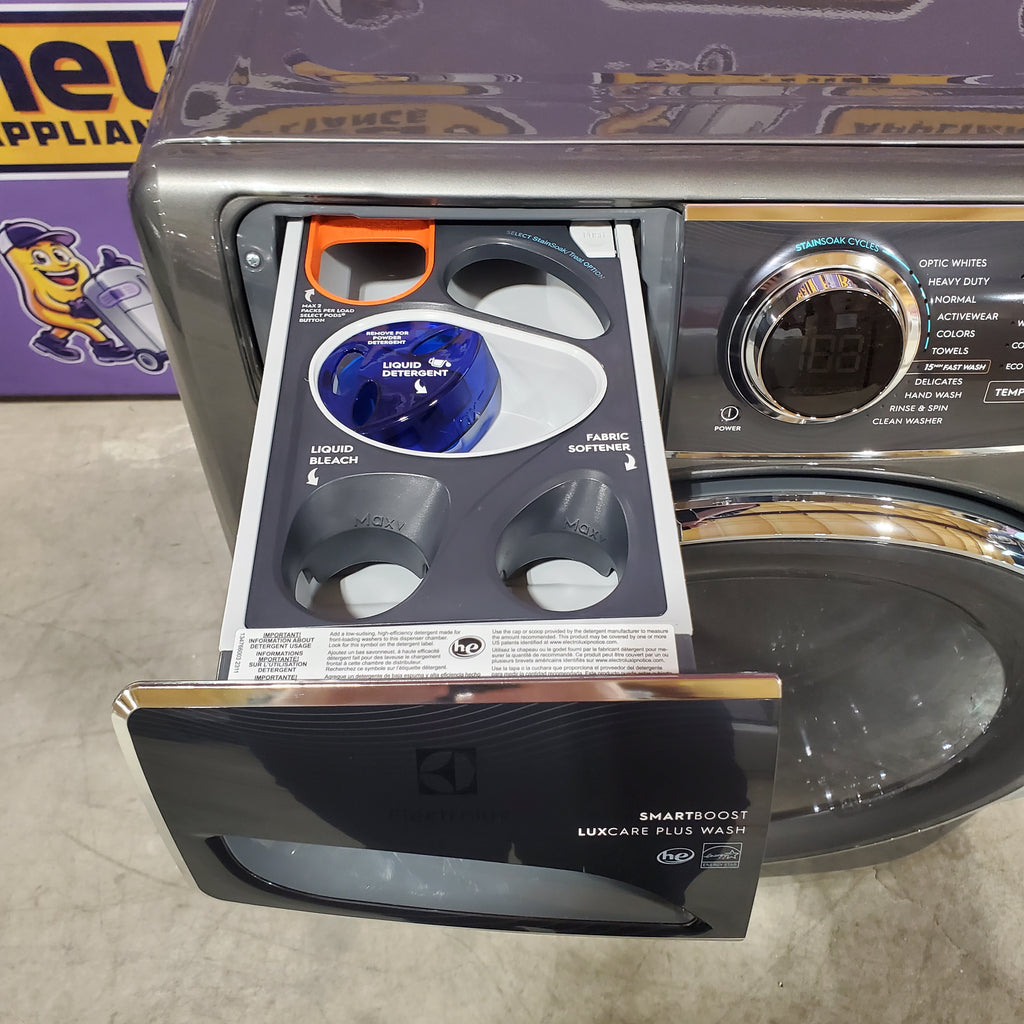 Electrolux Titanium Front Load 600 Series 4.5 Cu. Ft. Washer with Smartboost ELFW7637AT - Scratch & Dent (Minor) and Electrolux 8 cu. ft. vented Front Load Stackable 600 Series Electric Dryer with LuxCare Dry 16098 - ELFE7637AT - Scratch & Dent (Moderate)