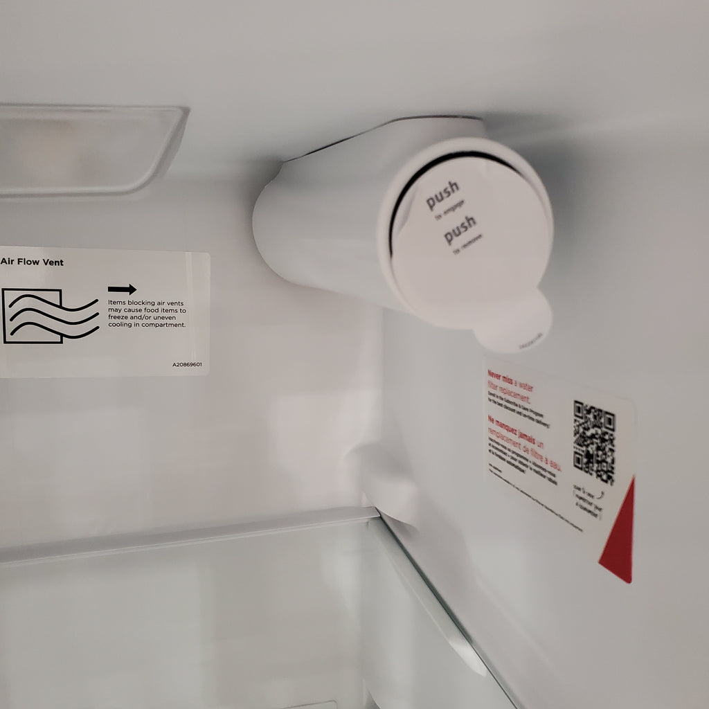 Pictures of Frigidaire 33" Wide 22.3 cu. ft. ENERGY STAR Side by Side Refrigerator Stainless Steel with Exterior Water and Ice Dispenser 4SD458 - FRSS2323AS - Scratch & Dent (Major) - Neu Appliance Outlet - Discount Appliance Outlet in Austin, Tx