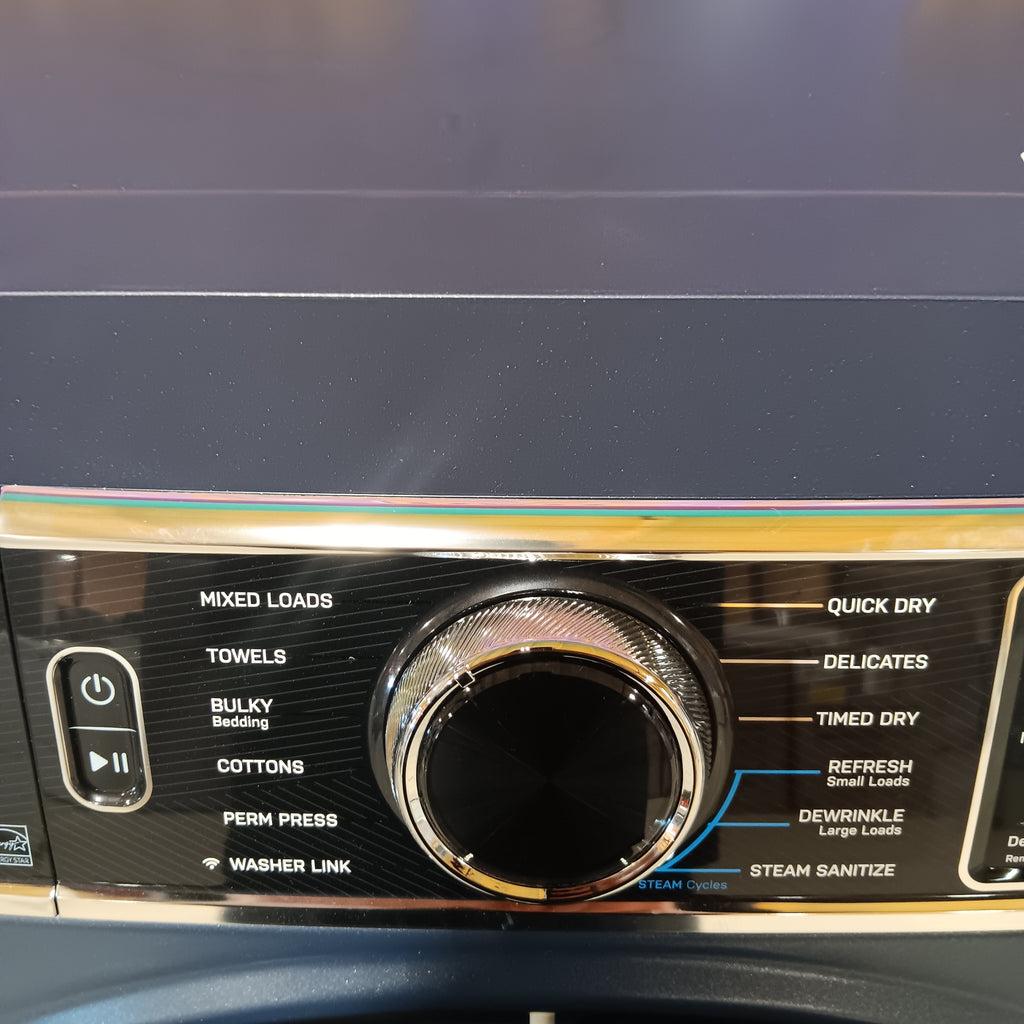 GE PFD87ESPVRS Control panel of a dryer with various settings and a large central dial.