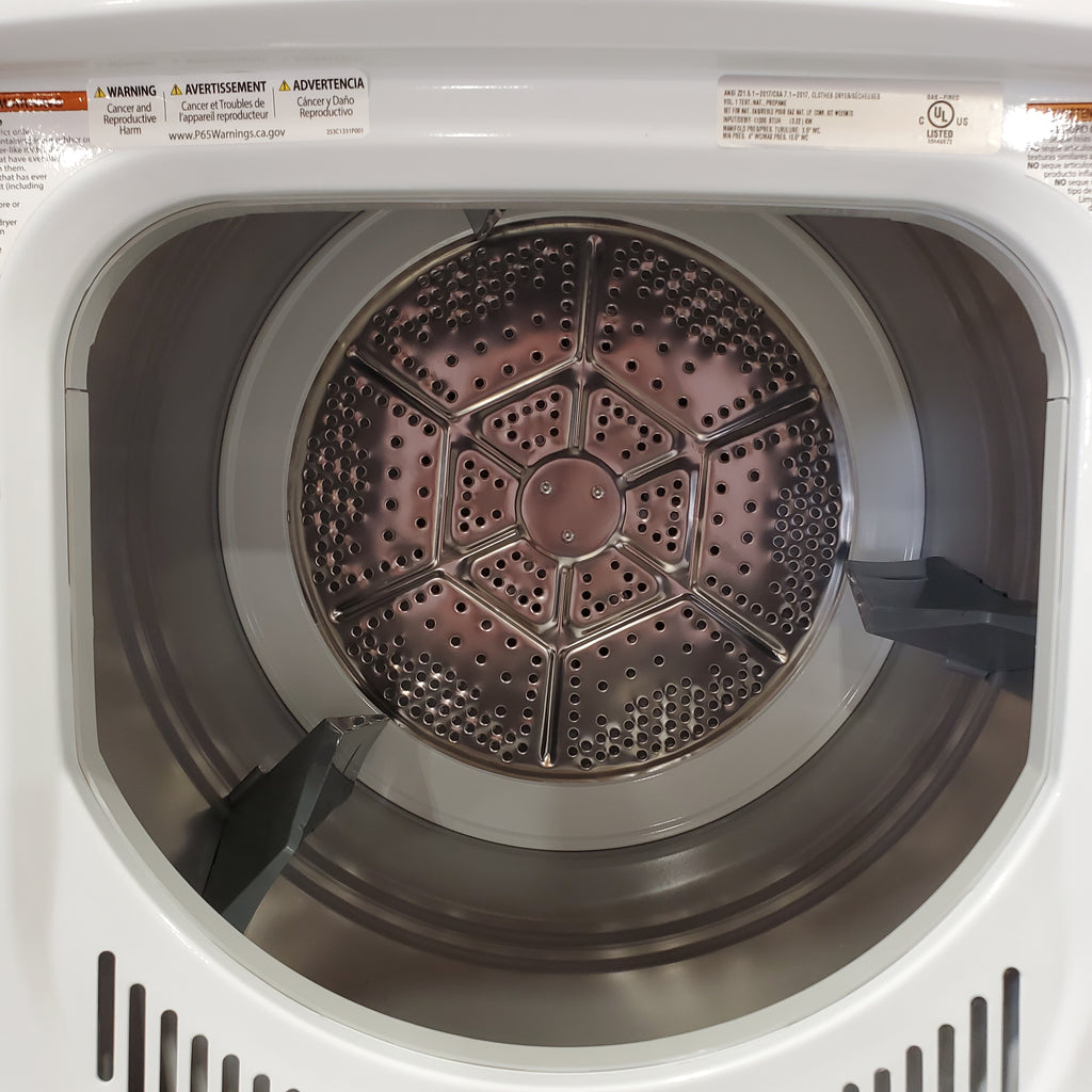 GE 24 in.  Spacemaker 2.3 cu. ft. Washer and 4.4 cu. ft. Gas Laundry Center with Stainless Steel Wash Basket 31134SD181 - GUD24GSSMWW - Scratch & Dent (Minor)