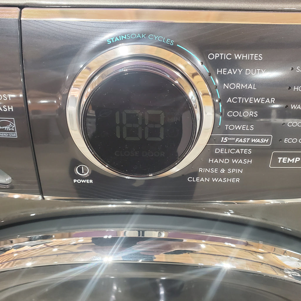 Pictures of Electrolux Titanium Front Load 600 Series 4.5 Cu. Ft. Washer with Smartboost ELFW7637AT - Scratch & Dent (Minor) and Electrolux 8 cu. ft. vented Front Load Stackable 600 Series Electric Dryer in Titanium with LuxCare Dry 16032 - ELFE7637AT - New in Box - Neu Appliance Outlet - Discount Appliance Outlet in Austin, Tx