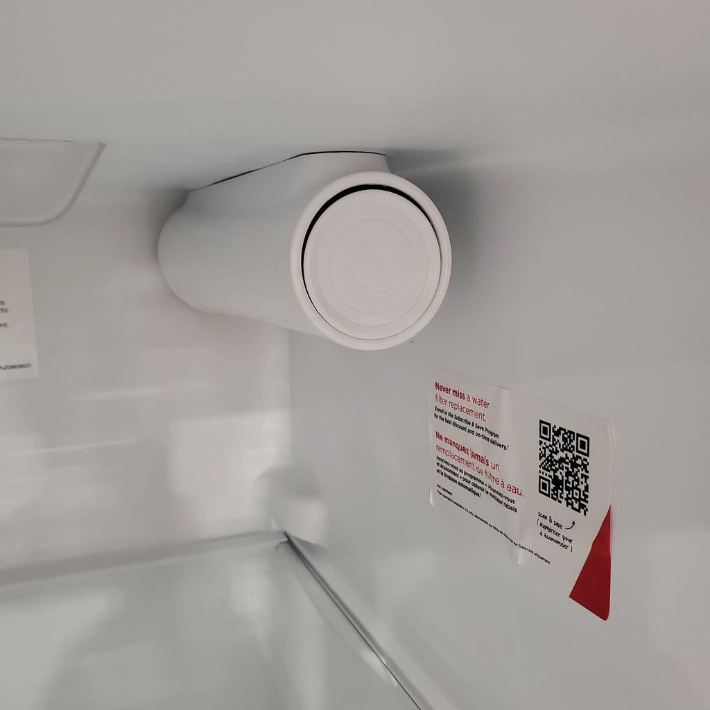 Pictures of Frigidaire 33" Wide 22.3 cu. ft. ENERGY STAR Side by Side Refrigerator Stainless Steel with Exterior Water and Ice Dispenser 20SD102 - FRSS2323AS - Scratch & Dent (Minor) - Neu Appliance Outlet - Discount Appliance Outlet in Austin, Tx