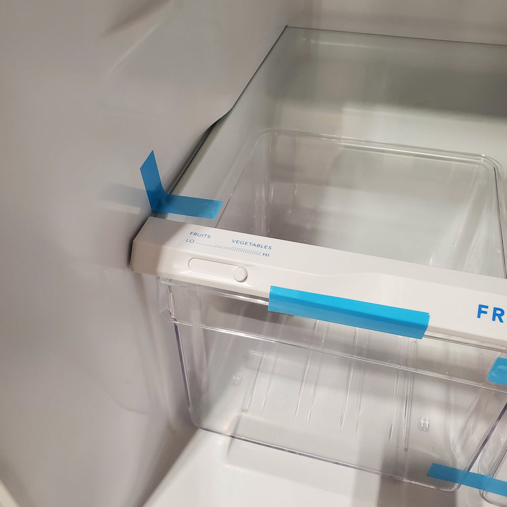 Frigidaire Top Freezer 18 Cu. Ft. Capacity Refrigerator with Spacious Interior Storage and Bright LED Lighting in White FFHT1822UW - Scratch and Dent (Minor)