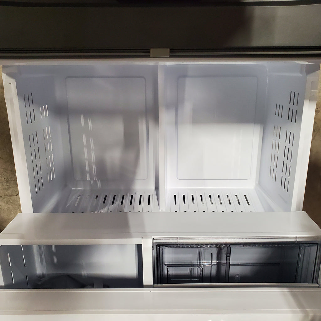 Open Samsung Bespoke 3-Door French Door RF30BB6600QL Refrigerator with empty shelves inside