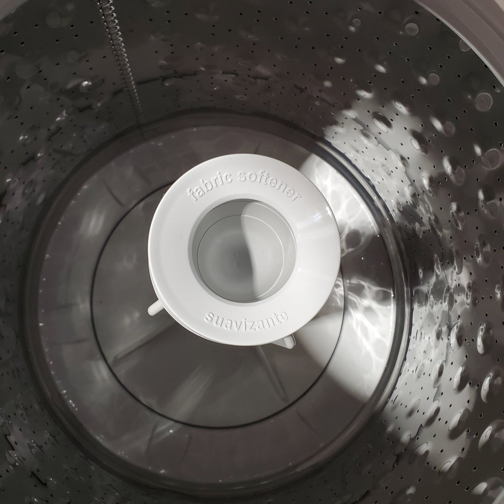 Pictures of GE Unitized Spacemaker® 2.3 cu. ft. Capacity Washer with Stainless Steel Basket and 4.4 cu. ft. Capacity Electric Dryer 251310SD915 - GUD24ESSMWW - Scratch & Dent (Minor) - Neu Appliance Outlet - Discount Appliance Outlet in Austin, Tx