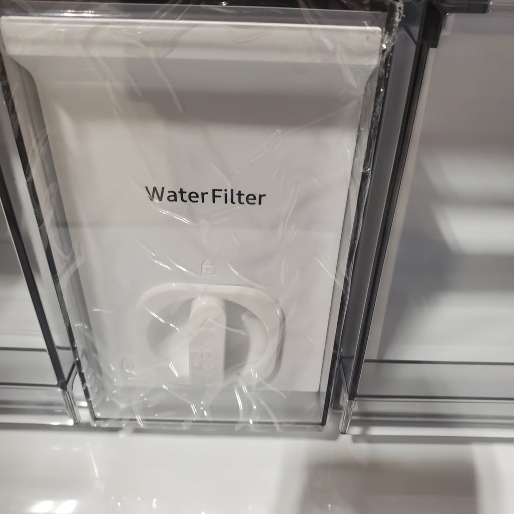 Water filter package inside a Samsung Bespoke RF90F29AECRAA 4-Door French Door Refrigerator 