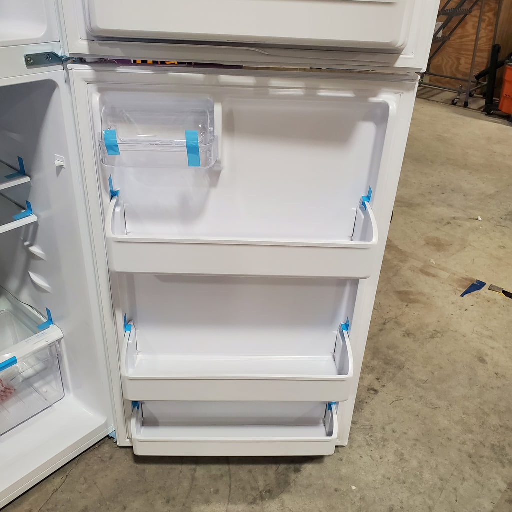 Frigidaire Top Freezer 18 Cu. Ft. Capacity Refrigerator with Spacious Interior Storage and Bright LED Lighting in White FFHT1822UW - Scratch and Dent (Minor)