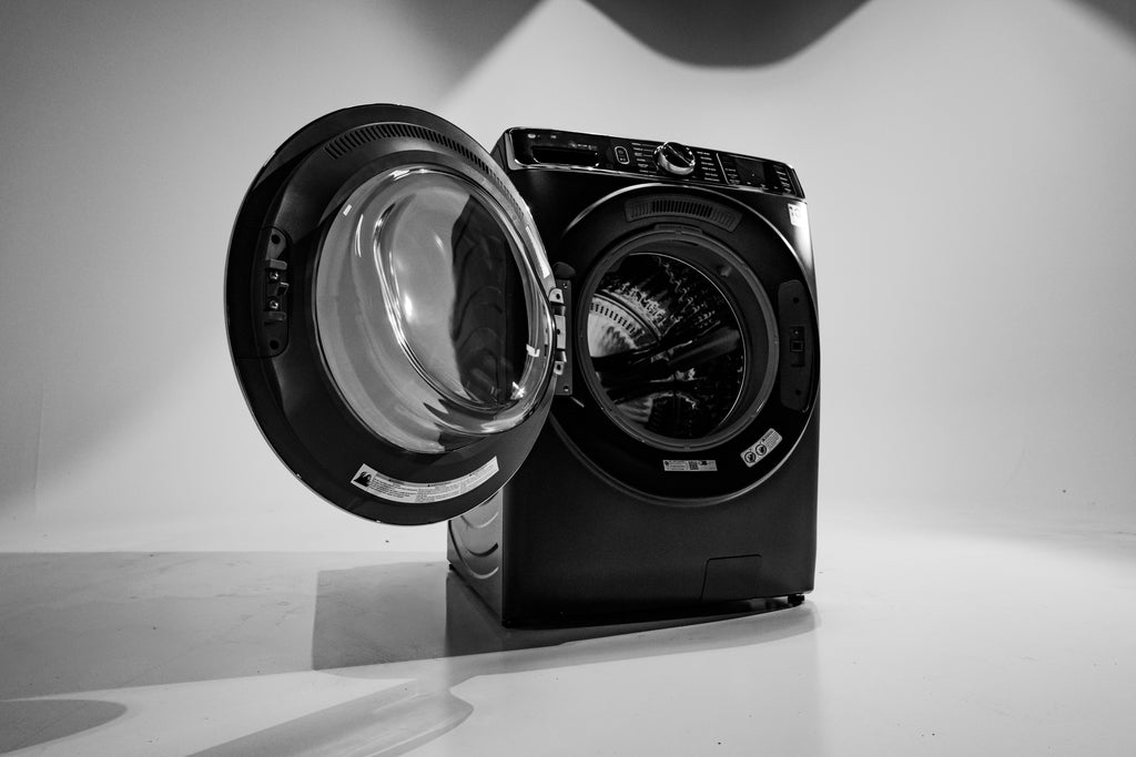GE PFW870SPVRS Black washing machine with open door on a white background