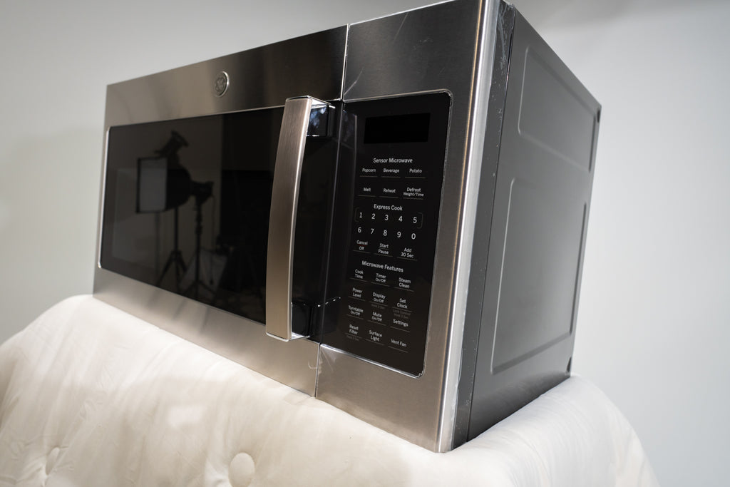 Pictures of GE Over-The-Range Sensor 1.9 Cu. Ft. Microwave Oven with Filter Indication Light and Steam Clean JVM7195SKSS - New in Box - Neu Appliance Outlet - Discount Appliance Outlet in Austin, Tx