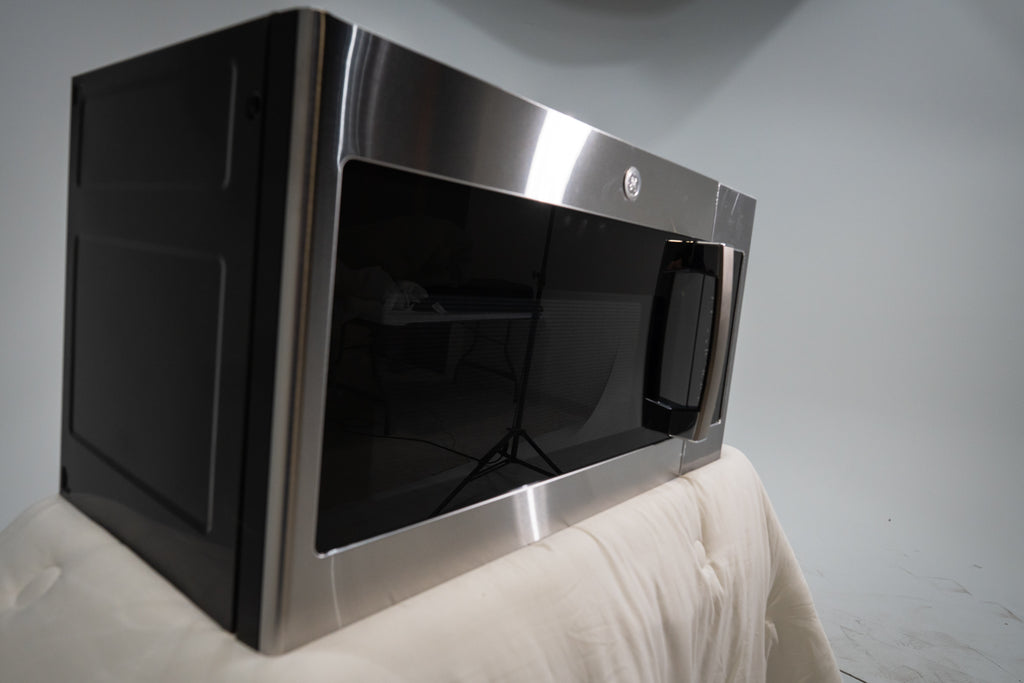 Pictures of GE Over-The-Range Sensor 1.9 Cu. Ft. Microwave Oven with Filter Indication Light and Steam Clean JVM7195SKSS - New in Box - Neu Appliance Outlet - Discount Appliance Outlet in Austin, Tx