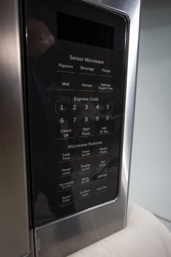 Pictures of GE Over-The-Range Sensor 1.9 Cu. Ft. Microwave Oven with Filter Indication Light and Steam Clean JVM7195SKSS - New in Box - Neu Appliance Outlet - Discount Appliance Outlet in Austin, Tx