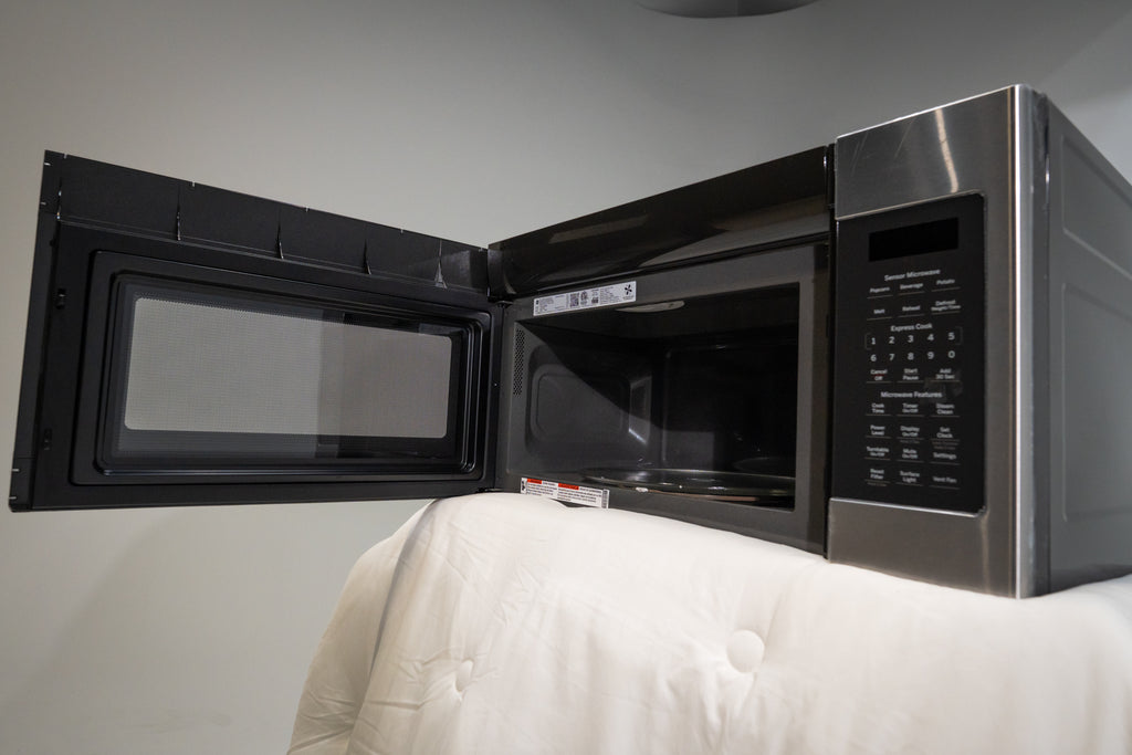 Pictures of GE Over-The-Range Sensor 1.9 Cu. Ft. Microwave Oven with Filter Indication Light and Steam Clean JVM7195SKSS - New in Box - Neu Appliance Outlet - Discount Appliance Outlet in Austin, Tx