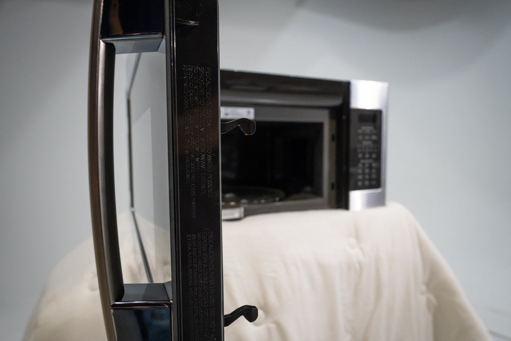 Pictures of GE Over-The-Range Sensor 1.9 Cu. Ft. Microwave Oven with Filter Indication Light and Steam Clean JVM7195SKSS - New in Box - Neu Appliance Outlet - Discount Appliance Outlet in Austin, Tx