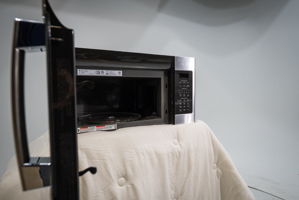 Pictures of GE Over-The-Range Sensor 1.9 Cu. Ft. Microwave Oven with Filter Indication Light and Steam Clean JVM7195SKSS - New in Box - Neu Appliance Outlet - Discount Appliance Outlet in Austin, Tx