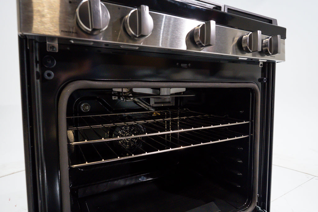 GE GGF600AVSS Stainless steel oven with open door on a white background