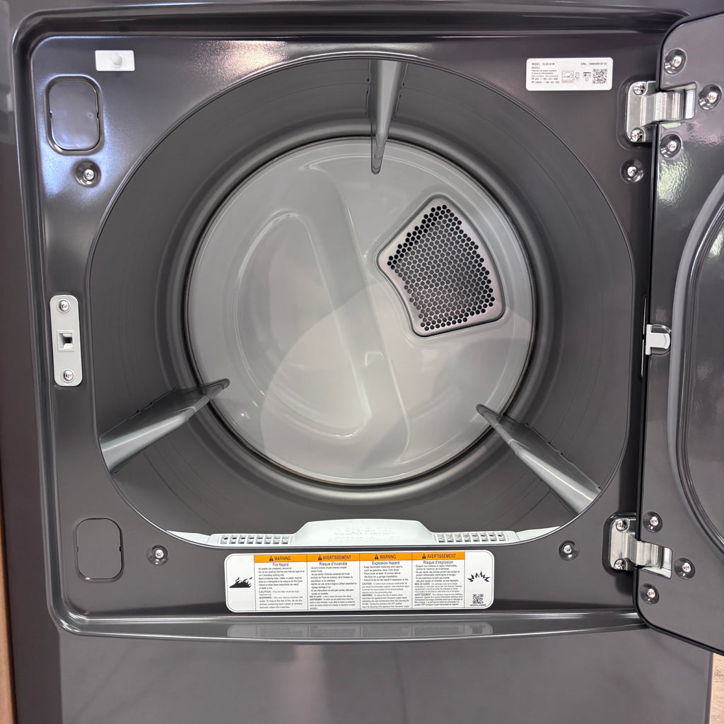 LG 4.1 cu. ft. Top Load Washer with 4-Way Agitator® and TurboDrum™ Technology WT6105CM and LG 7.3 cu. ft. Gas Dryer with Dial-A Cycle Knob ENERGY STAR and FlowSense Duct Clogging Indicator 15025 - DLG6101M - Open Box