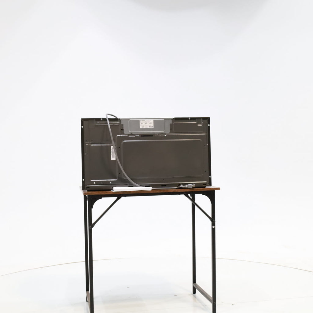 Pictures of GE Over-The-Range Sensor 1.9 Cu. Ft. Microwave Oven with Filter Indication Light and Steam Clean JVM7195SKSS - New in Box - Neu Appliance Outlet - Discount Appliance Outlet in Austin, Tx