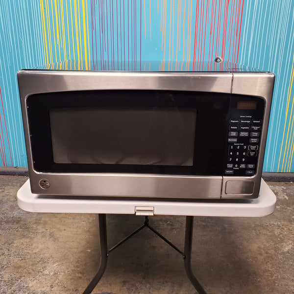 Stainless Steel GE 2.0 cu. ft. Countertop Microwave Oven with Sensor Cooking Controls - Scratch & Dent - Minor